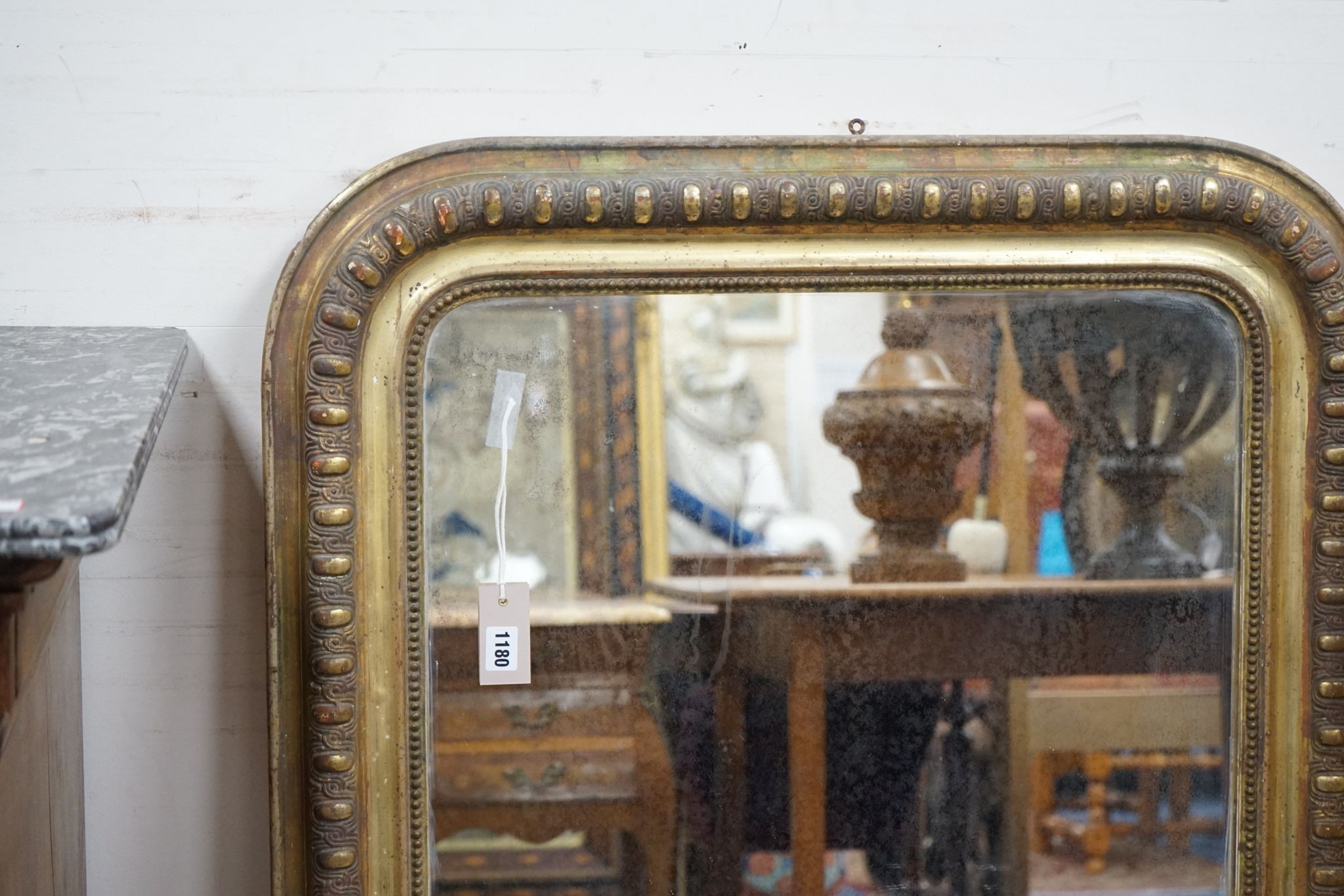 A 19th century French giltwood overmantel mirror, width 80cm, height 110cm